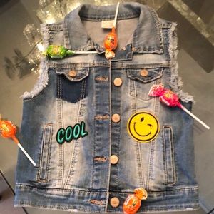 Jean vest with happy stickers